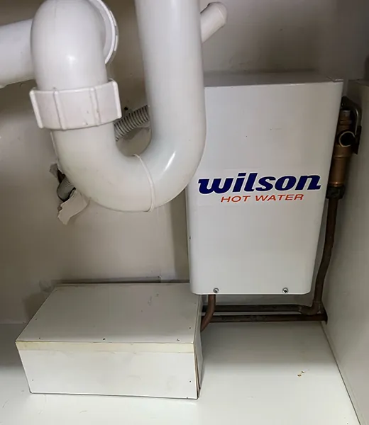 Instantaneous hot water unit fitted under a sink